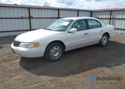 1999 Lincoln Continental из США, поврежденный, VIN 1LNHM97V2XY708917